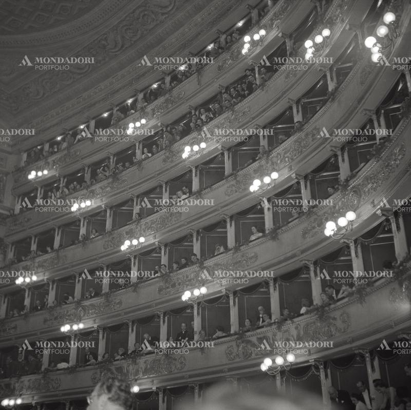 View of the right boxes of the cavea of the Teatro alla Scala in Milan during the season inauguration night; the audience, among them the President of the Italian Republic Giovanni Gronchi, shall watch the opera 'Norma' by Bellini, played by the singer Maria Callas. Milan, December 7, 1955. SPECIAL FEE  - CONTACT US FOR NOT EDITORIAL USAGE