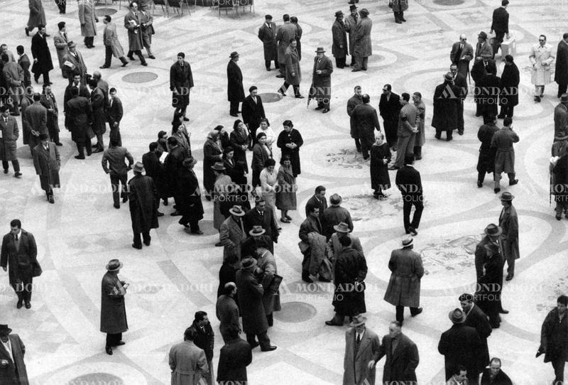 Some people walking in the shopping gallery Umberto I. Naples, February 1960 SPECIAL FEE  - CONTACT US FOR NOT EDITORIAL USAGE