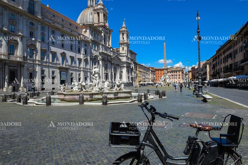 Piazza Navona almost empty, attended only by few residents, and without turists due to the Coronavirus pandemic (Covid-19). Rome (Italy), April 30th 2020