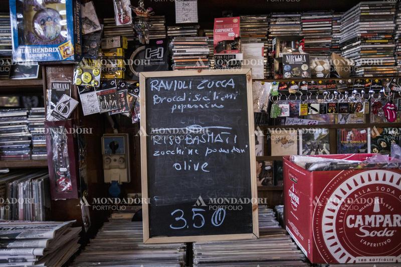 The daily menu of Bar Brunori written on a blackboard placed on top of vinyls. Rome (Italy), March 1st, 2021