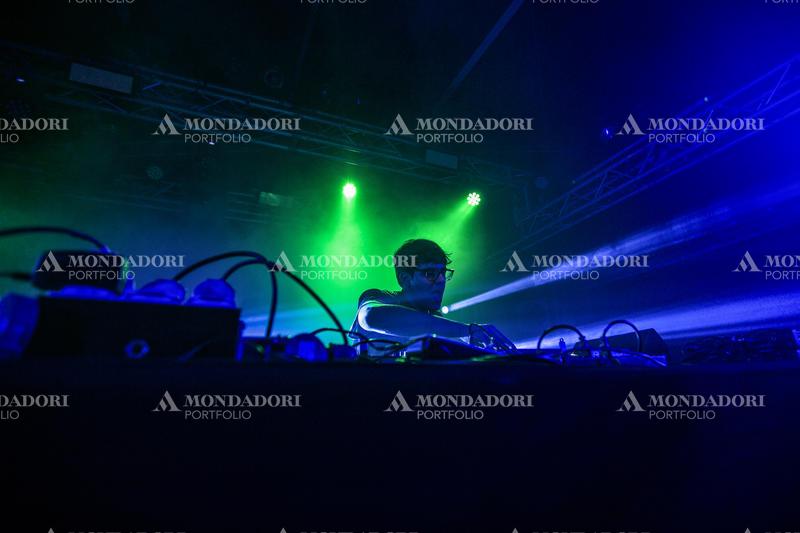 A DJ plays his music on the stage. Milan (Italy), February 1st, 2021