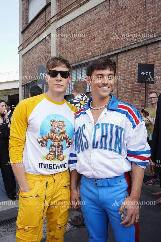 US writer and director Dustin Lance Black and British diver Tom Daley guests at the Moschino fashion show of Milan Fashion Week Men's Collection Spring Summer 2023. Milan (Italy), June 19th, 2022